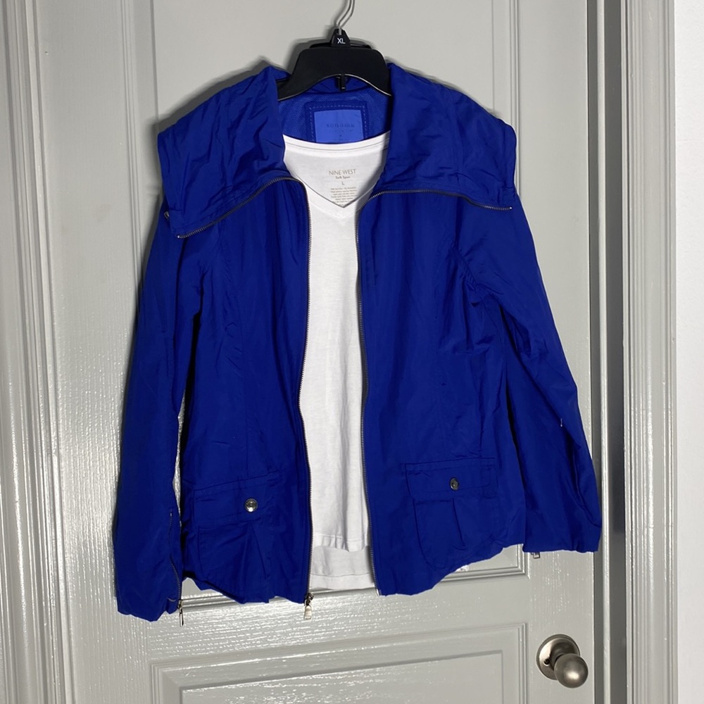 Blue windbreaker jacket size M